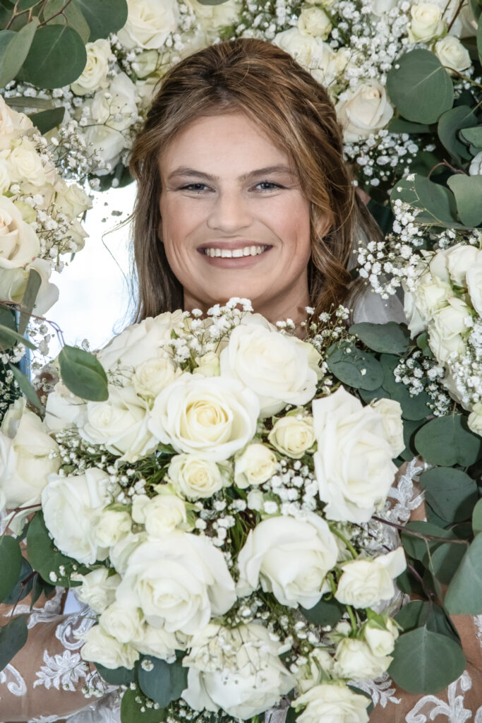 Flowers surrounding the brides face