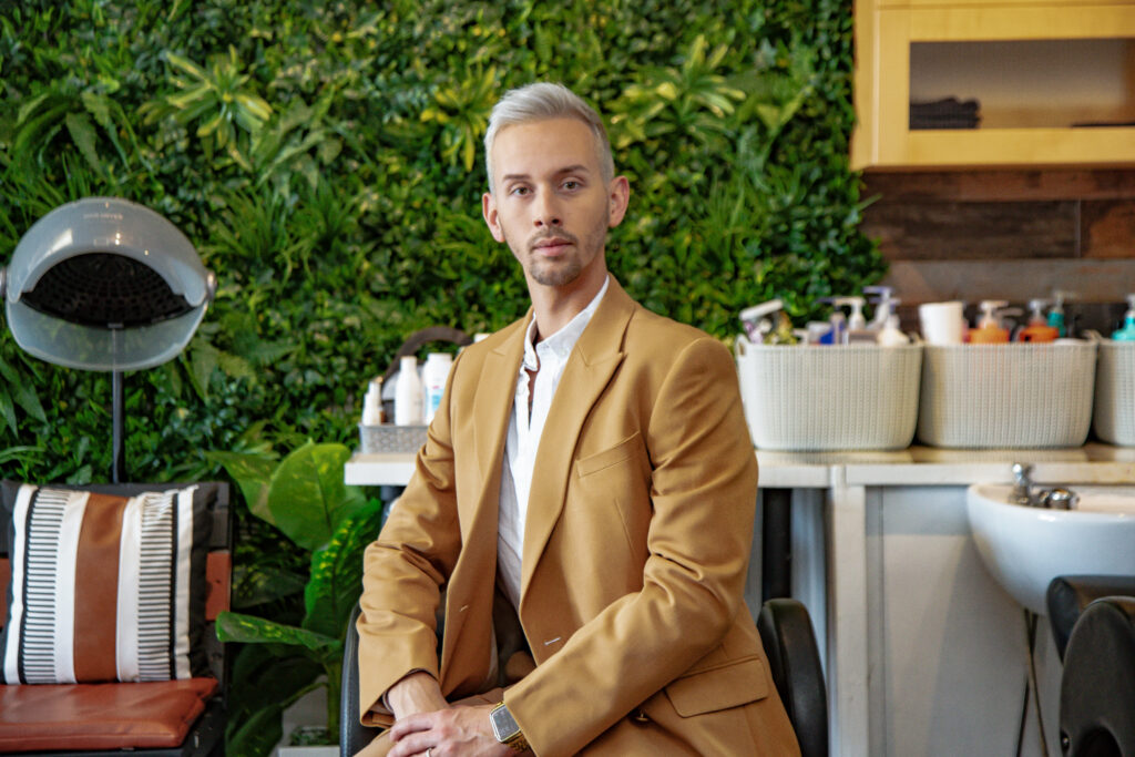 male branding photo inside of a hair salon