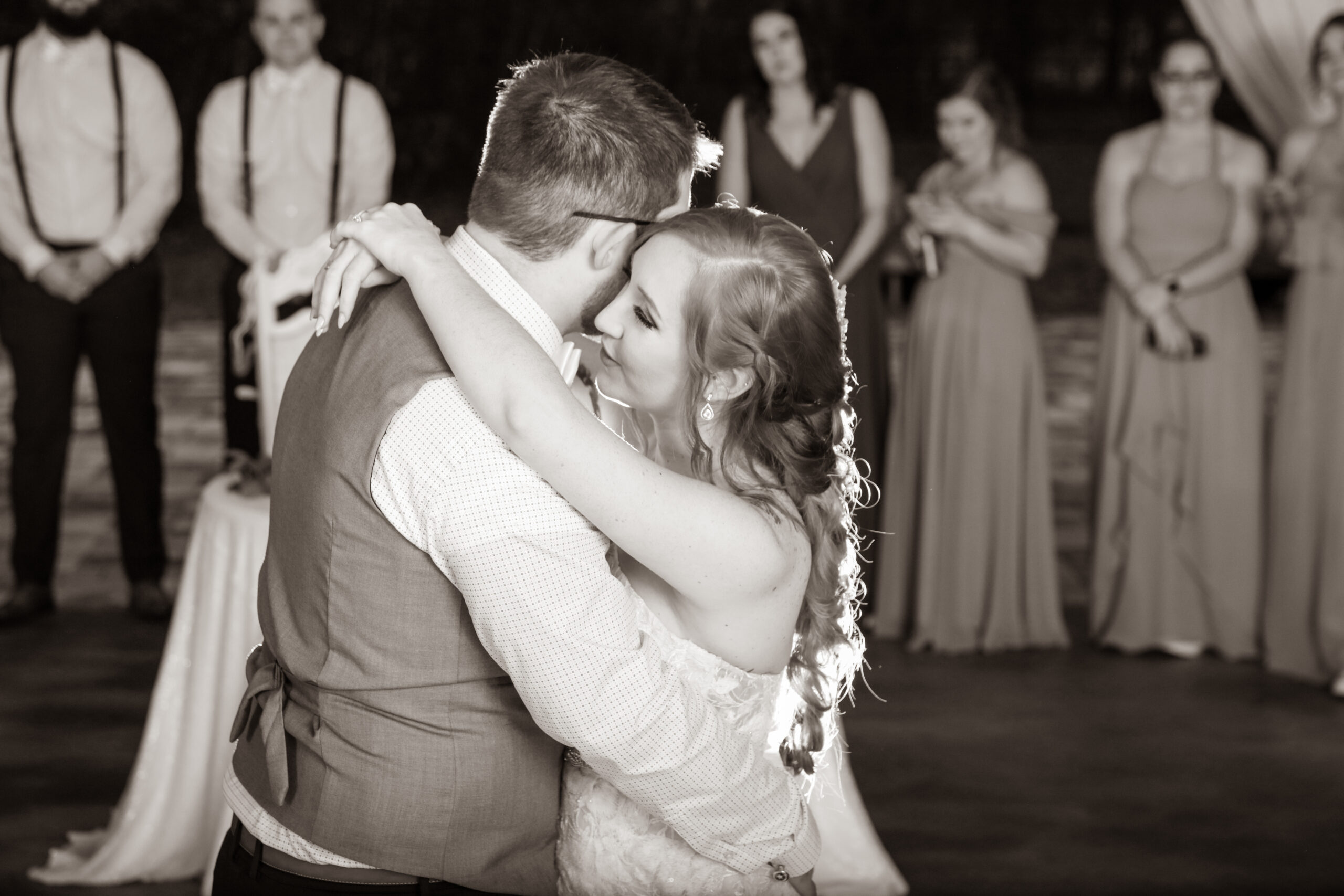 bride and grooms first dance during wedding reception