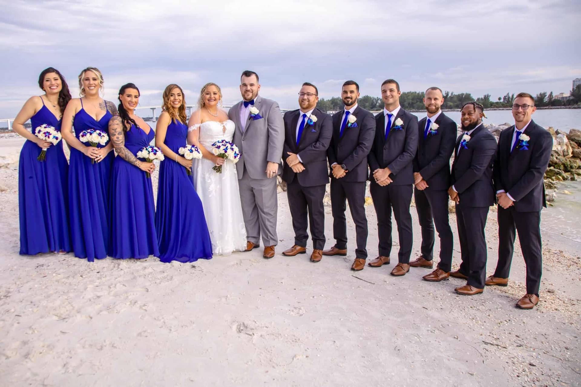 bridal party on the beach