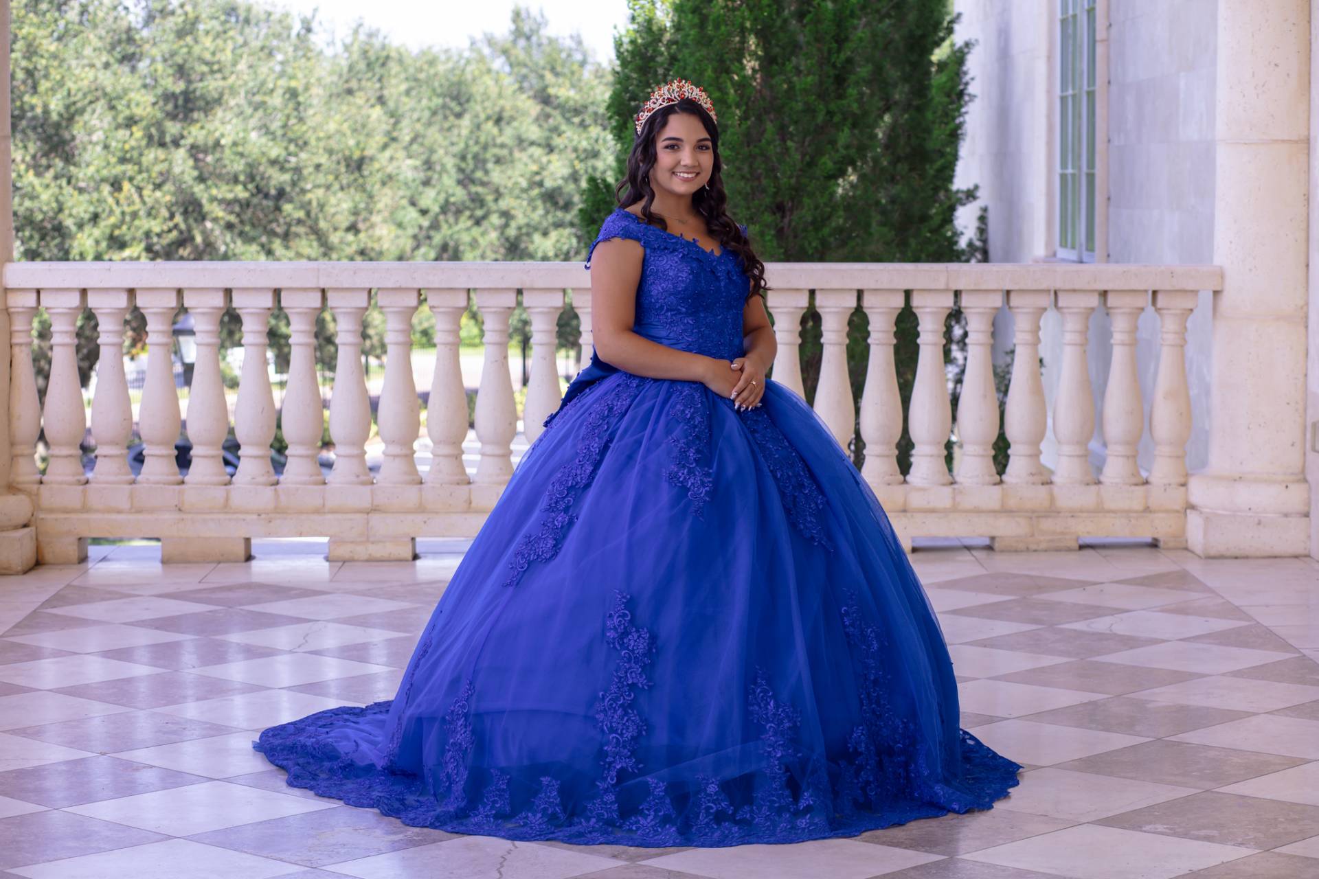 Birthday girl in her purple dress with tiara