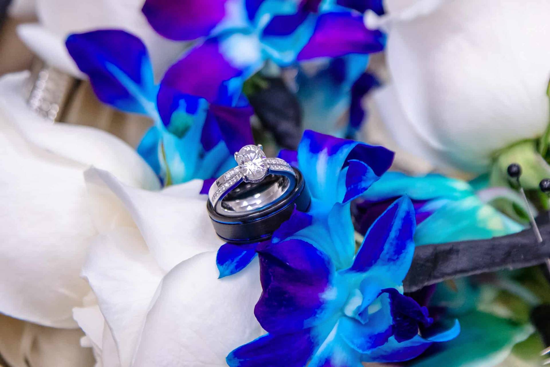 wedding rings inside of the brides flowers